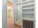 Hallway with built-in shelving and doorways leading to a bedroom and bathroom at 105 S Palmetto St, Summerville, SC 29483