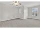 Bedroom features neutral paint, plush carpeting and natural light from large windows at 105 Waylon Dr, Summerville, SC 29483