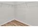 Walk-in closet with wire shelving and wood flooring at 105 Waylon Dr, Summerville, SC 29483