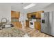 Modern kitchen featuring stainless steel appliances and stunning granite countertops at 105 Waylon Dr, Summerville, SC 29483
