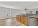 Open kitchen featuring a breakfast bar overlooking a bright living space at 105 Waylon Dr, Summerville, SC 29483