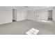Large upstairs common area with neutral paint, plush carpeting and access to other rooms at 105 Waylon Dr, Summerville, SC 29483