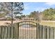 Enjoy beautiful water views from the backyard of this home with mature trees and a pond at 105 Waylon Dr, Summerville, SC 29483
