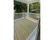 A charming back deck provides a perfect space for outdoor entertaining and relaxing in nature at 1082 Glenshaw St, North Charleston, SC 29405