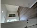 Bright living room features large windows and light wood floors at 1082 Glenshaw St, North Charleston, SC 29405
