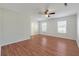 Bedroom with hardwood flooring, a ceiling fan, and natural lighting at 113 Broad River Dr, Summerville, SC 29485