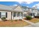 Charming single-story home featuring neutral siding, a covered porch, and well-maintained landscaping at 113 Broad River Dr, Summerville, SC 29485