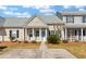 Charming single-story home featuring neutral siding, a covered porch, and well-maintained landscaping at 113 Broad River Dr, Summerville, SC 29485