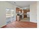 Open kitchen with stainless steel appliances and sliding door to patio at 113 Broad River Dr, Summerville, SC 29485