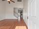 Bright living room features wood floors, a high ceiling, and a staircase leading to the upper level at 113 Broad River Dr, Summerville, SC 29485