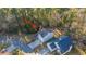 Overhead view of property showing roof, neighboring houses, driveway and wooded areas at 1253 Lakefront Dr, Charleston, SC 29412