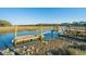 The wooden dock allows you to get out on the water to enjoy the views at 1253 Lakefront Dr, Charleston, SC 29412