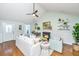 Cozy living room with vaulted ceilings, fireplace, modern furnishings, and hardwood floors, creating an inviting atmosphere at 1253 Lakefront Dr, Charleston, SC 29412