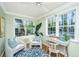 Bright office featuring natural light, comfortable seating, and a vintage-style desk at 1253 Lakefront Dr, Charleston, SC 29412