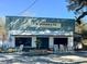 Quaint seafood restaurant featuring rocking chairs outside, perfect for a relaxed dining experience at 127 Oak St, McClellanville, SC 29458