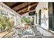 Relaxing screened porch with a wood ceiling, overhead lighting, and exterior views at 127 Oak St, McClellanville, SC 29458