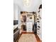 Functional walk-in closet with clothing racks, shelving, and a built-in drawer unit for optimum storage efficiency at 127 Oak St, McClellanville, SC 29458