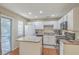 Functional kitchen with white cabinets, modern appliances, and ample counter space at 128 Hornby Cir, Goose Creek, SC 29445