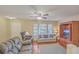Comfortable living room with hardwood floors, a ceiling fan, and plenty of seating at 128 Hornby Cir, Goose Creek, SC 29445