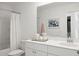 Bright bathroom features a bathtub with shower, large mirror, and modern finishes for a clean and stylish design at 133 Threaded Fern St, Summerville, SC 29485