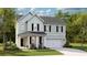 Charming two-story home with light siding, black shutters, and a well-maintained lawn at 133 Threaded Fern St, Summerville, SC 29485