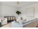 Bright and airy living room with comfortable seating, stylish decor, and a view of the outdoors at 133 Threaded Fern St, Summerville, SC 29485