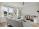 Comfortable living room featuring a large sofa, stylish decor, and a scenic view at 133 Threaded Fern St, Summerville, SC 29485