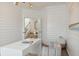 Stylish home office with white shiplap walls, modern decor, and ample natural light at 133 Threaded Fern St, Summerville, SC 29485