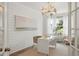 Bright home office with modern lighting, stylish decor, and a view to the outdoors at 133 Threaded Fern St, Summerville, SC 29485