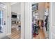 Inviting entryway with closet, hardwood floors, and a glimpse of the cozy living room fireplace at 142 Midtown Ave, Summerville, SC 29486