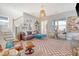 Bright and airy living room with plush furnishings, modern decor, and a cozy atmosphere at 142 Midtown Ave, Summerville, SC 29486