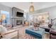 Inviting living room with a modern fireplace, stylish furnishings, and open layout at 142 Midtown Ave, Summerville, SC 29486