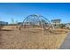 Community playground featuring climbing structure, benches and mature landscaping for families to enjoy at 142 Midtown Ave, Summerville, SC 29486