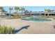 Resort style pool with palm trees and ample seating for residents to enjoy the outdoors at 142 Midtown Ave, Summerville, SC 29486