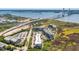 Stunning aerial view of a coastal condominium community with a bridge and ocean views at 155 Wingo Way # 421, Mount Pleasant, SC 29464