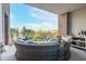 Relaxing outdoor balcony featuring comfortable seating and views of the surrounding landscape at 155 Wingo Way # 421, Mount Pleasant, SC 29464