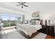 Primary bedroom with sitting area and large windows that let in natural light at 155 Wingo Way # 421, Mount Pleasant, SC 29464