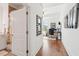 View from hallway into a bedroom and bathroom at 155 Wingo Way # 421, Mount Pleasant, SC 29464