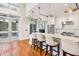 Kitchen featuring a breakfast bar, stainless steel appliances, and bright lighting at 155 Wingo Way # 421, Mount Pleasant, SC 29464