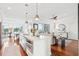 Open-concept living space featuring a modern kitchen island, dining area, and inviting living room at 155 Wingo Way # 421, Mount Pleasant, SC 29464
