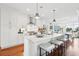 Bright, modern kitchen with white cabinets, stainless steel appliances, and a marble island at 155 Wingo Way # 421, Mount Pleasant, SC 29464