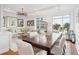 Well-lit living space with a sectional sofa, modern chandelier, and an open floor plan at 155 Wingo Way # 421, Mount Pleasant, SC 29464