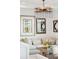 Cozy living room area with a crystal chandelier, decorative mirrors and a comfortable sofa at 155 Wingo Way # 421, Mount Pleasant, SC 29464