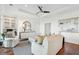 Living room boasts modern decor with a light color palette and hardwood flooring at 155 Wingo Way # 421, Mount Pleasant, SC 29464