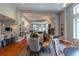Large lobby featuring a fireplace, multiple seating areas, kitchen, and natural light at 155 Wingo Way # 421, Mount Pleasant, SC 29464