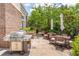 Outdoor cooking with built-in grill and Big Green Egg with seating area for dining and socializing at 155 Wingo Way # 421, Mount Pleasant, SC 29464