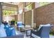 Comfortable outdoor patio featuring stylish furniture, a water feature, and a relaxed atmosphere at 155 Wingo Way # 421, Mount Pleasant, SC 29464