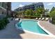 Beautiful kidney-shaped pool and sun loungers offer residents an outdoor oasis for relaxation at 155 Wingo Way # 421, Mount Pleasant, SC 29464