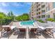 Resort-style pool and sun loungers offer residents an outdoor oasis for relaxation and socializing at 155 Wingo Way # 421, Mount Pleasant, SC 29464