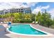 Resort-style pool and sun loungers offer residents an outdoor oasis for relaxation and socializing at 155 Wingo Way # 421, Mount Pleasant, SC 29464